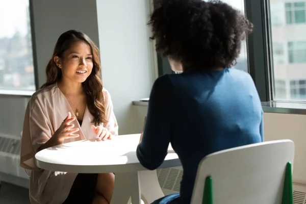 Women Sharing Ideas in Conversation